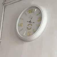 ساعت بزرگ دایره سفید طلایی