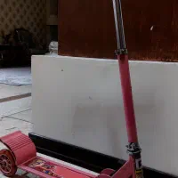 اسکوتر صورتی