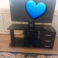 میز زیر تلویزیونی شیشه ای