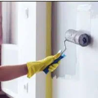 نقاش .رنگ امیزی ساختمان