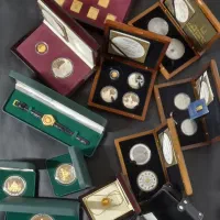 گلد کوئست سکه نقره گلدکویست ساعت طلا مدال