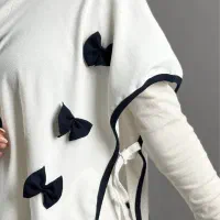 پانچ پاپیونی|لباس|گرگان, |دیوار