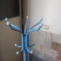 چوب لباسی  با پایه سنگی
