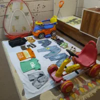 لباس و اسباب بازی کودک