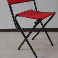 یک عدد صندلی تاشو مسافرتی و راحتی