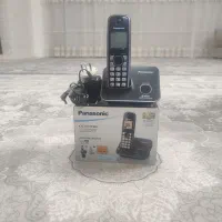 تلفن بیسیم پاناسونیک و دوربین فیلمبرداری نیکون