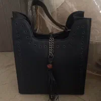 ساک دستی همراه کیف