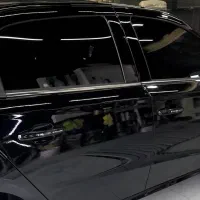 نصب تخصصی شیشه دودی اورجینال در محل مشتری