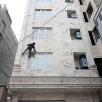 پیچ کردن رولپلاک ساختمان دیوار سنگ وسیمان راپل کار