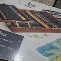 مداد رنگی و مداد شمعی با کیف چوبی آلمانی با بارکد