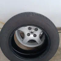 چهار حلقه لاستیک و یک رینگ اصلی