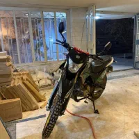 موتور تریل|موتورسیکلت|رباط‌کریم, رباط‌کریم|دیوار