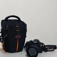 کنون1300Dبهمراه کیف و مموری*اشانتیون*