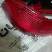 یک عدد لاستیک با یک جفت چراغ عقب 206