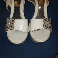 کفش|کیف، کفش، کمربند|تربت جام, میان جام|دیوار