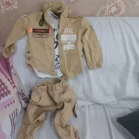 تعدادی لباسو کفش بچه