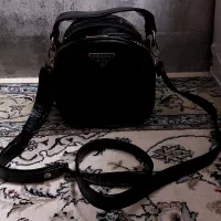 کیف|کیف، کفش، کمربند|اصفهان, باغ فدک|دیوار