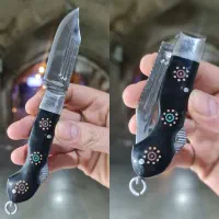 ضامندار بابا دسته میخ‌دوزی شده