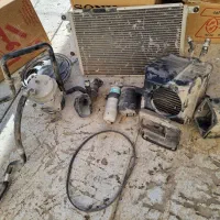 کولر ماشین مزدا کندانسور اوپراتور کمپرسور اصلی