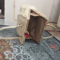 کیف مجلسی|کیف، کفش، کمربند|رباط‌کریم, رباط‌کریم|دیوار