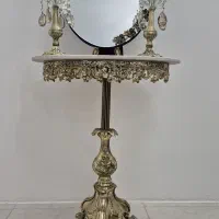 آینه و شمعدان با میز سنگی