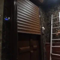 نصب کرکره برقی و دربهای شیشه ای اتوماتیک ودستی