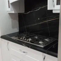 اجرای کانترتاپ سنگ طبیعی کوارتز کورین سرامیک ال جی|خدمات پیشه و مهارت|آمل, |دیوار