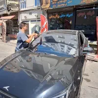 نصب شیشه دودی نانوسرامیک