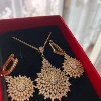 نیم ست طرح خورشید نقره ابکاری طلا|جواهرات|کرج, باغستان|دیوار