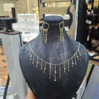 گردنی شرابه ای وزن ۱‌.۱۳۰ گرم گوشواره ۱.۱۲ گرم