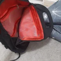 کوله پشتی|کیف، کفش، کمربند|رشت, فلسطین|دیوار