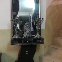 آینه و کمد و شمعدان