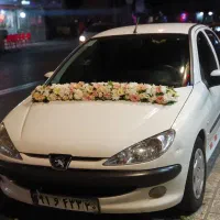 ماشین عروس دسته گل عروس