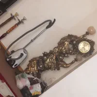 تلویزیون،مبل،ساعت