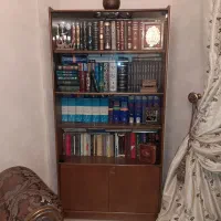 کتاب خانه همراه  مقداری کتاب