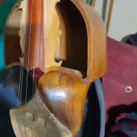 قیچک آلتو غیچک|سازهای سنتی|تهران, فلسطین (میدان انقلاب)|دیوار