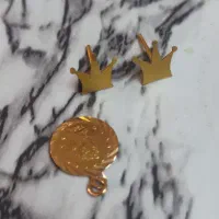 گوشواره و سکه دلاری