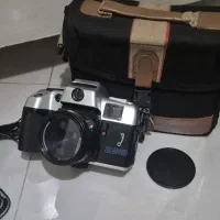 دوربین عکاسی المپیا.فلاش دوربین.کیف دوربین یا غذا