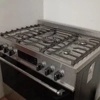 اجاق گاز فر دار تمام استیل اسنوا