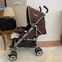 کالسکه عصایی آلمانی کمجا سبک نو نو بهمراه ساک بچه