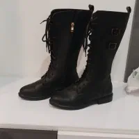 فروش پالتو و چکمه