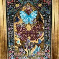 تابلو شمع و گل و پروانه