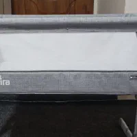 تخت و گهواره کنار مادر