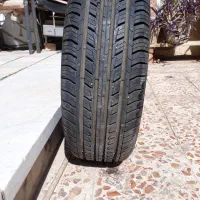لاستیک نو با رینگ نو|قطعات یدکی و لوازم جانبی|قم, باجک یک|دیوار