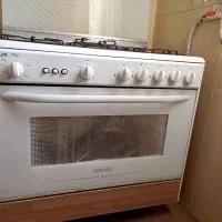 گاز فر دار پنج شعله سفید با دو جوجه گردان بزرگ|اجاق گاز و لوازم برقی پخت‌وپز|مشهد, استاد یوسفی (شهرک غرب)|دیوار