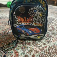 کوله پشتی چراغ دار مدرسه|کیف، کفش، کمربند|رشت, کوی قدس|دیوار