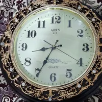 ساعت دیواری چرخشی دو طرفه