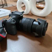 دوربین canon با لنز 18-135mm IS USM