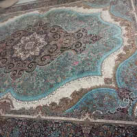 فرش مشهد ۱۲ متری فیروزه ای در حد نو