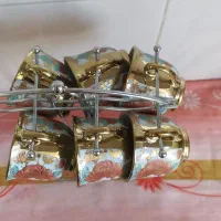 فنجان قهوه خوری وسه عدد قندان